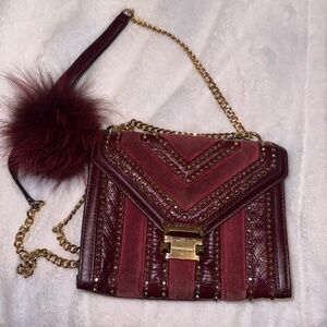 Micheal Kors burgundy bag